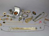many different types of jewelry on the table