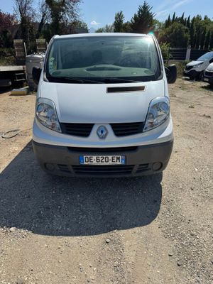 a picture of a white van parked in a parking lot