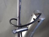 an image of a lamp that is on top of a metal pole
