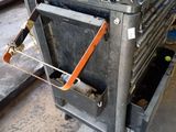 an old oven that is being worked on in the garage