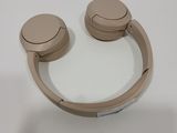 a pair of headphones sitting on a white surface