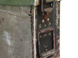 an old metal box with a handle on it
