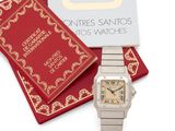 an image of a cartier ladies ' s wrist watch and a book