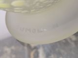 a close up view of a glass bowl with food inside of it