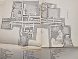 an open book with a map of a city on it