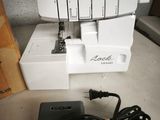 a sewing machine that is sitting on a table