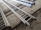 four ladders that are sitting on the ground