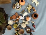 a lot of small figurines that are on the table