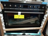 two ovens stacked on top of each other in a box