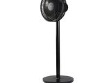 an image of a black fan on a stand on a white background