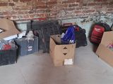 many boxes that are sitting on the floor next to each other