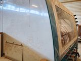 an image of a boat being built in a garage