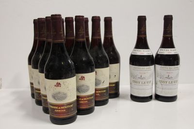 six bottles of wine are lined up in a row on a table