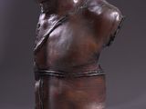 sculpture of a bust of a man with a hat on his head