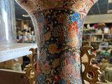 a vase that is sitting on a table in a store