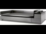 an image of a stainless steel counter top with a drawer underneath it