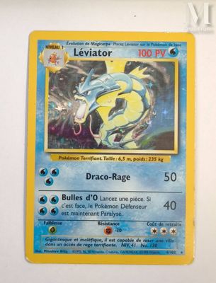 a close up of a pokemon card on a wall