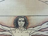 drawing of a man with a vitrive body on a piece of paper