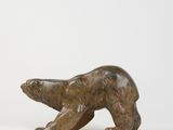 bronze sculpture of a polar bear on a white background