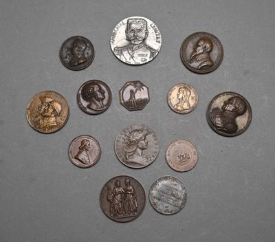 a lot of coins that are sitting on a table