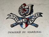 a picture of a logo on the wall of a building