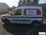a van that is parked on the side of the road