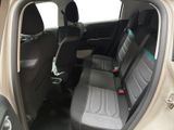 a car that has two seats in the back of it