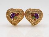 a pair of yellow gold earrings with amethorate, amethorate and amethorate stones