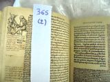 a book with a piece of paper on top of it