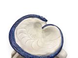 an image of a blue and white bowl with a snake on it
