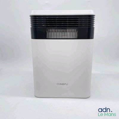 un purificateur d'air blanc et noir posé sur une table blanche