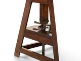 an image of a wooden stool with a wooden seat on a white background