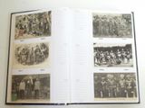 a book with pictures of people on it on a table