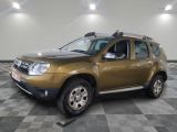 a picture of a gold dacia parked on a checkered floor
