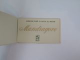 an open book with a picture of a mandrage on it