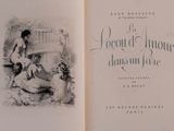 an open book with a drawing of a woman and a man