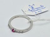 a picture of a diamond and ruby ring with a price tag on it