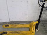 a cart and a hand truck in a garage