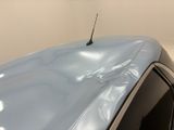 a close up of a car with a antenna on top of it