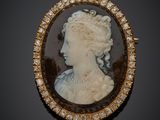 a close up of a woman ' s profile in a broocher