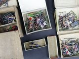 several boxes of assorted assorted items sitting on top of a table