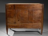 an old wooden cabinet with two doors and two drawers