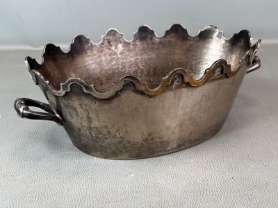 silver plated bowl with scalloped edge and handle