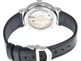 a watch that is sitting on a black leather strap