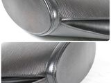 two pictures of a pair of black leather bags