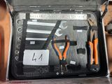 a tool kit in a box with tools in it