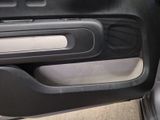 a close up of a car door with a speaker in it