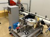 a machine that is sitting on a cart in a room