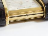 a close up picture of a watch in a case