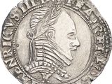 une pièce de monnaie en argent portant l'image d'un visage de femme